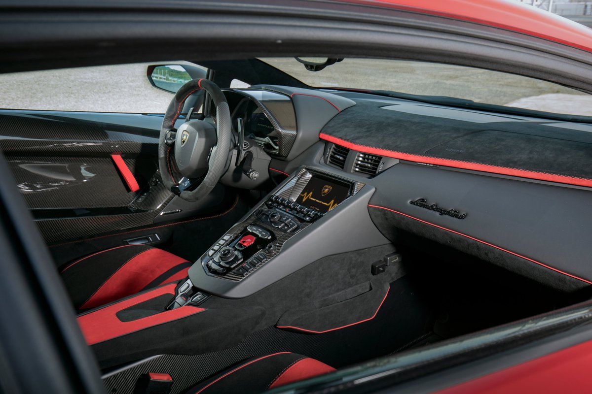 LamboClubGlobal's tweet photo. #AventadorSVJ technological look of carbon fiber, featured in the monocoque as well as the doors, seats, center tunnel and console, coexists with a design of clear aeronautical inspiration, while the leather and Alcantara upholstery adds a bold touch to the luxurious interior. https://t.co/A5Wl7bCbqc