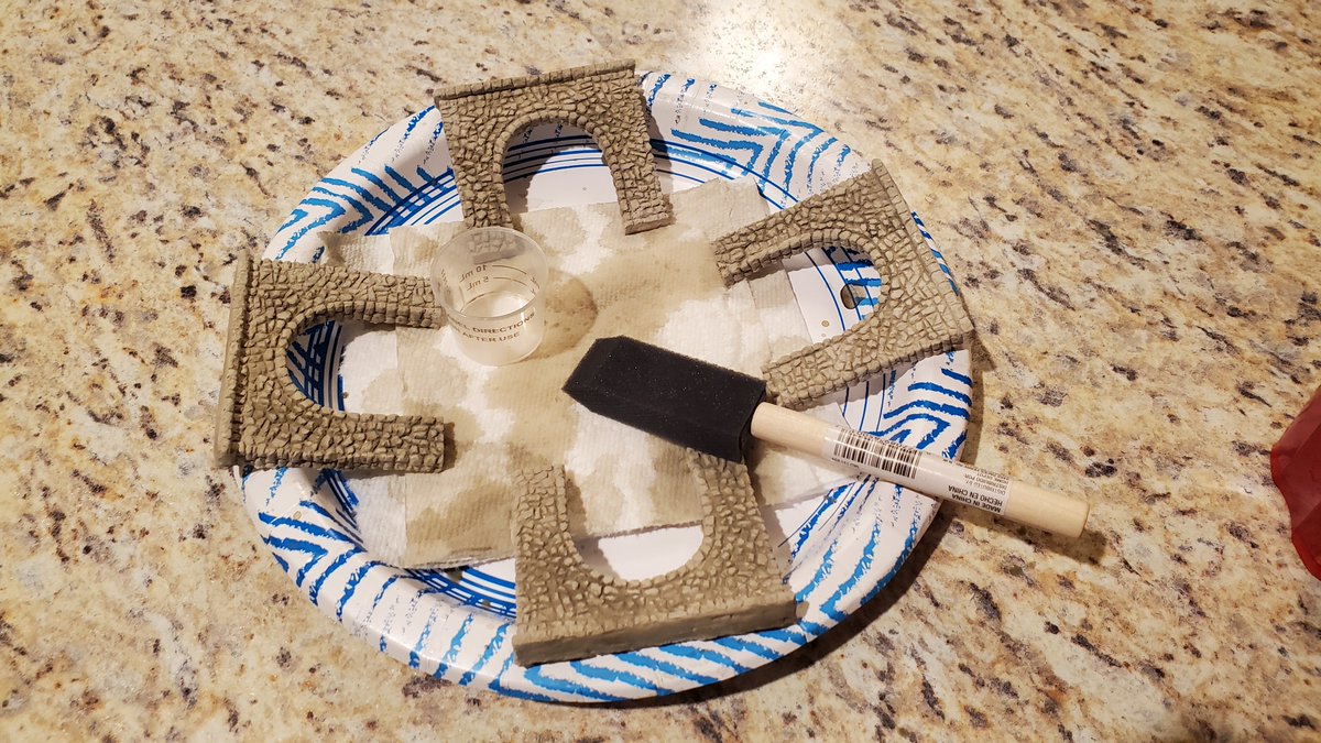 Painted, for lack of a better description, the tunnel portals. Followed <a href="/WoodlandScenics/">Woodland Scenics</a> video on the painting process. Except I did not do the step with the black color, as I did not happen to order it. #KATOttrakprogress