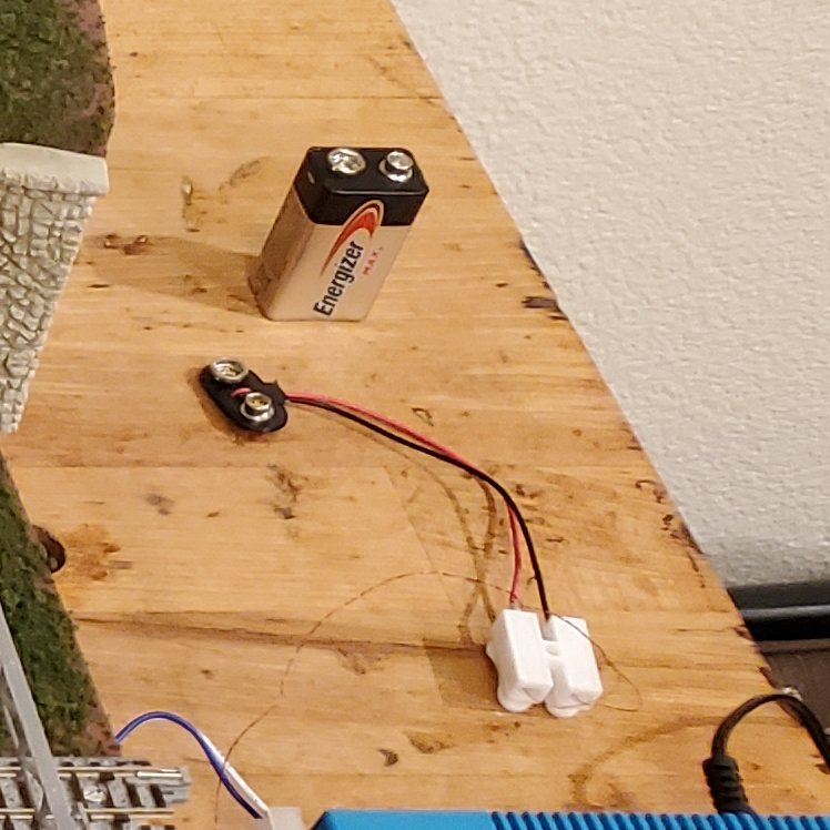 Attached working LED lamp post to the one platform and glued them both in place with hot glue. In case they ever need removed, hot glue is easily removed. LED is powered my a 9 volt battery with a 410ohm resistor. #KATOttrakprogress