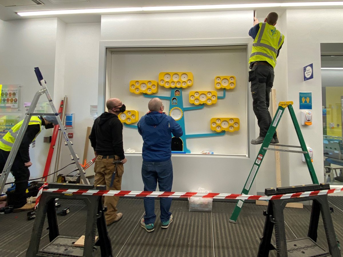Artplus_team's tweet photo. Our new donor recognition took @wearetado months of work. Each character is made up of multiple layers, hand sanded and individually painted. That’s before the massive tree and all the names! It’s displayed in a bespoke cabinet, made and constructed on site by @HeronCabinets. https://t.co/UatHs9zF6m