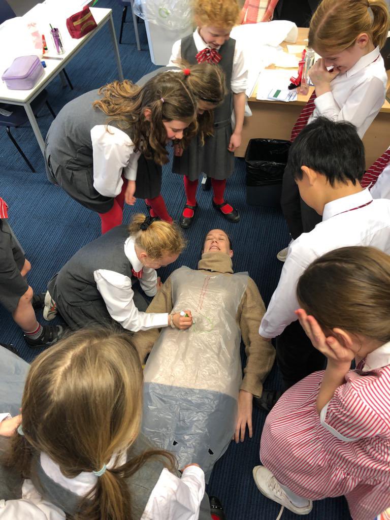 BGS_LowerSch's tweet photo. Year 4 enjoyed turning themselves inside out to track the route our food takes in the body. They even helped Miss Jones track her food! #BGS_Science #getinvolved #teamwork https://t.co/QkwNwYdHEc