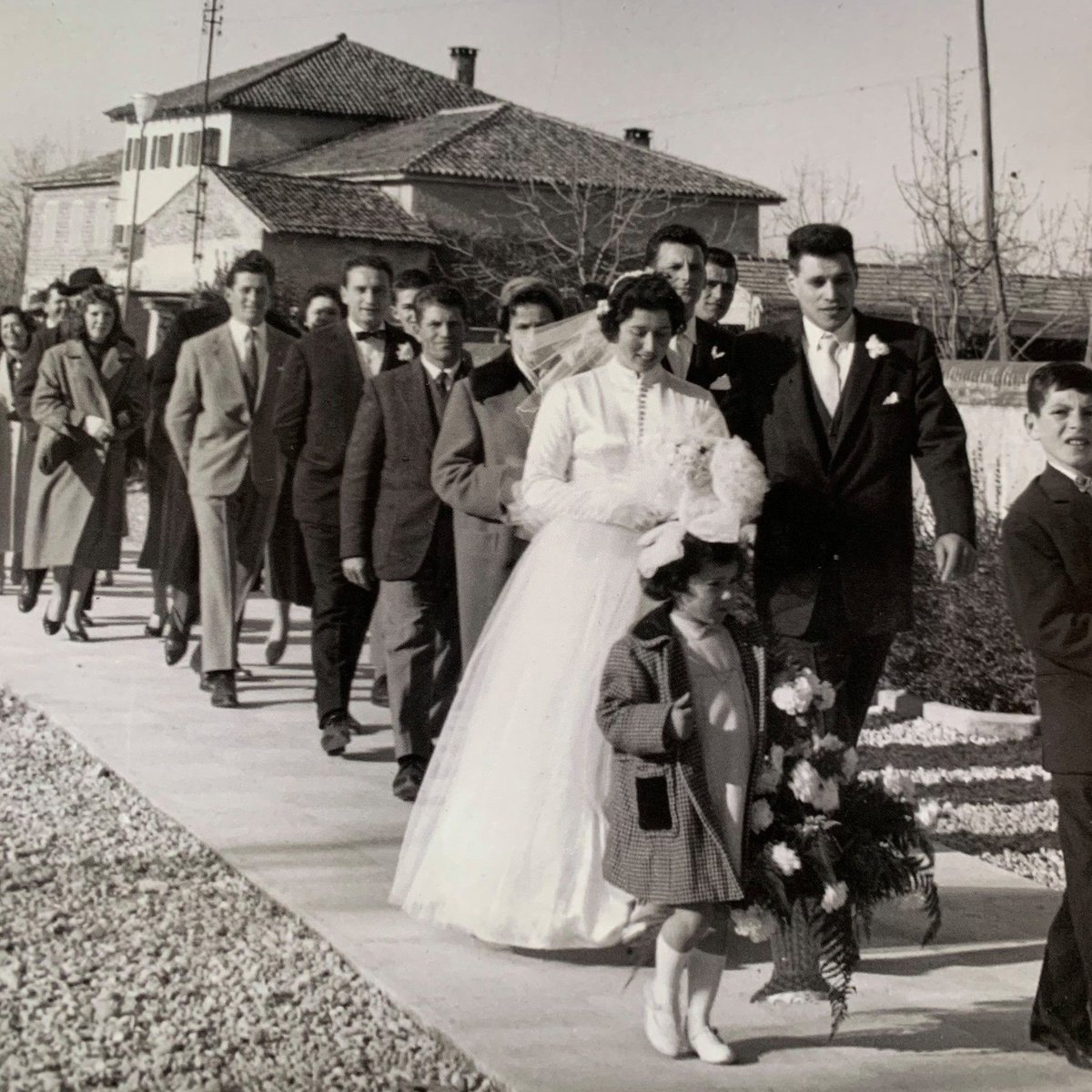 WeAreBe_org's tweet photo. A couple of times a week Be takes Natalia to visit her husband with this stunning photo album containing photos from their wedding, 62 years ago, of the couple walking through a small Italian village and vineyards on their way to the church ⛪️💞💍 #dementia #agedcareaustralia https://t.co/2gOpW7UPBj