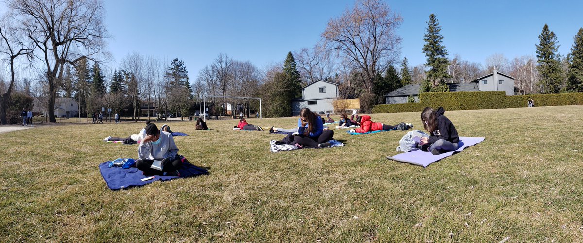 MsSealeyHNMCS's tweet photo. Grade 8's @HNMCS enjoying the sunshine on this beautiful spring day.  We took our D.E.A.R (Drop Everything &amp; Read) time outside for a change and it was fantastic. https://t.co/mHszcDEYt8