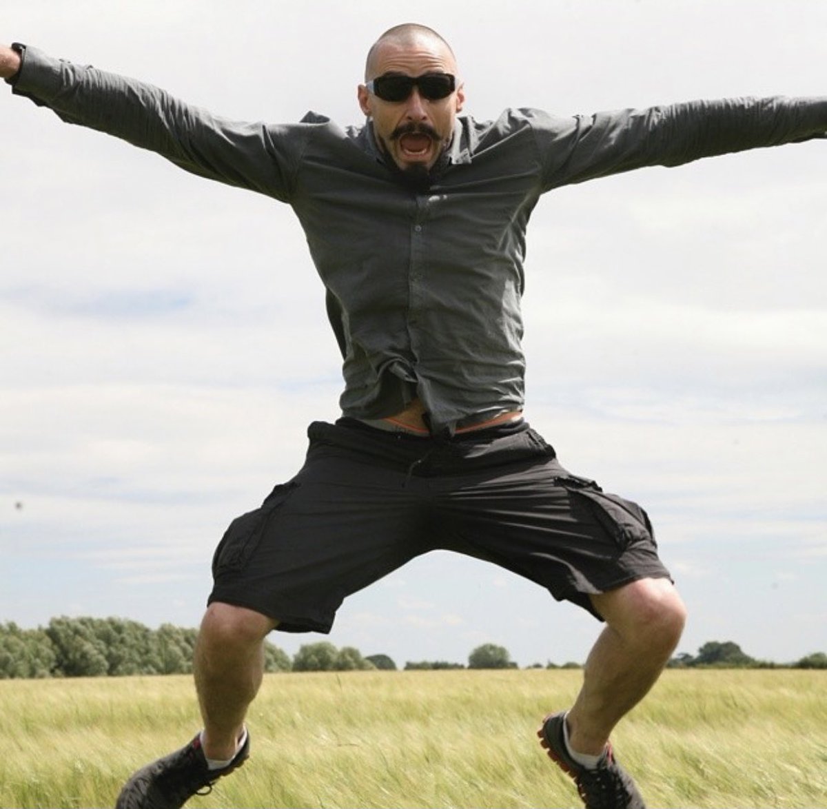 JackmansLanding's tweet photo. It's National Goof Off Day! It's easy to find photos of Hugh being a total goofball while he enjoys life, like in this shot from July of 2014. 🤪😘😎 #hughjackman #nationalgoofoffday #goofball #blackbeardhaircut #nicejump 📷: Hugh Jackman https://t.co/WDEsbXx1CJ
