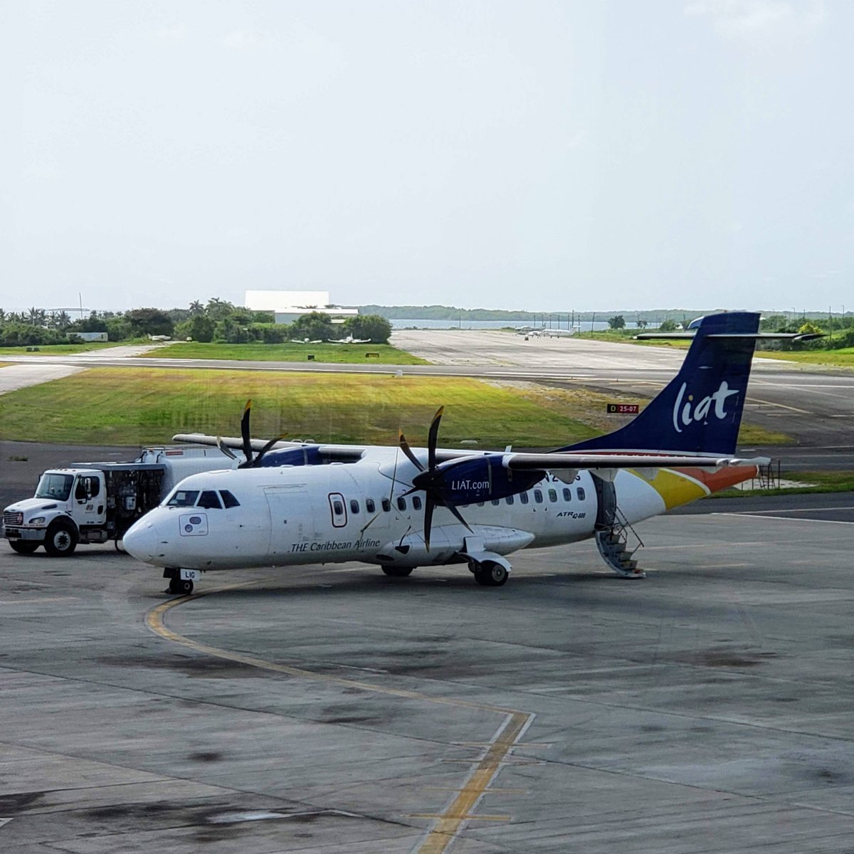 LIAT_1974Ltd's tweet photo. Whether it's a trip home or the escape you need, we can take you there. Book your next Caribbean trip at https://t.co/kRszavmr39 or call our Reservations Call Centre for assistance.  #ConnectingTheCaribbean #LIAT #TheCaribbeanAirline #TeamBlueTail https://t.co/JgCdWs7uiq