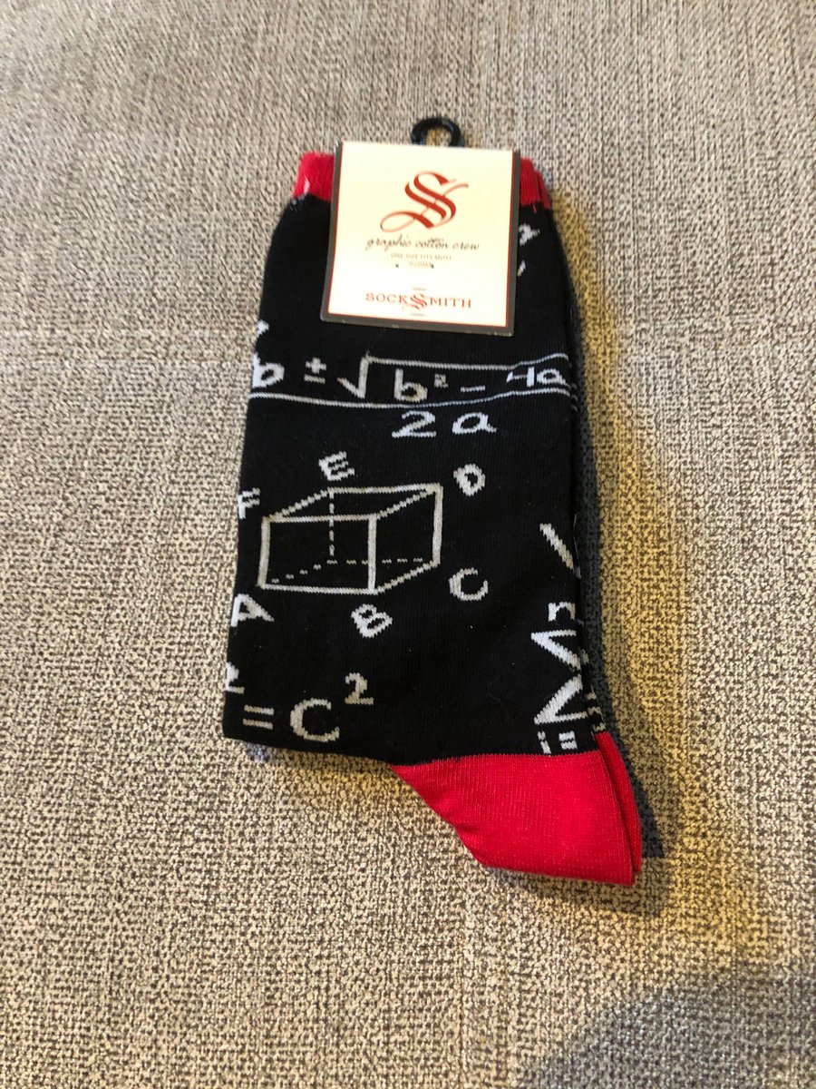 TAThompson29's tweet photo. My daughter surprised me with these new socks! What great way to celebrate Math every week again!! https://t.co/Zm3KHpn44d