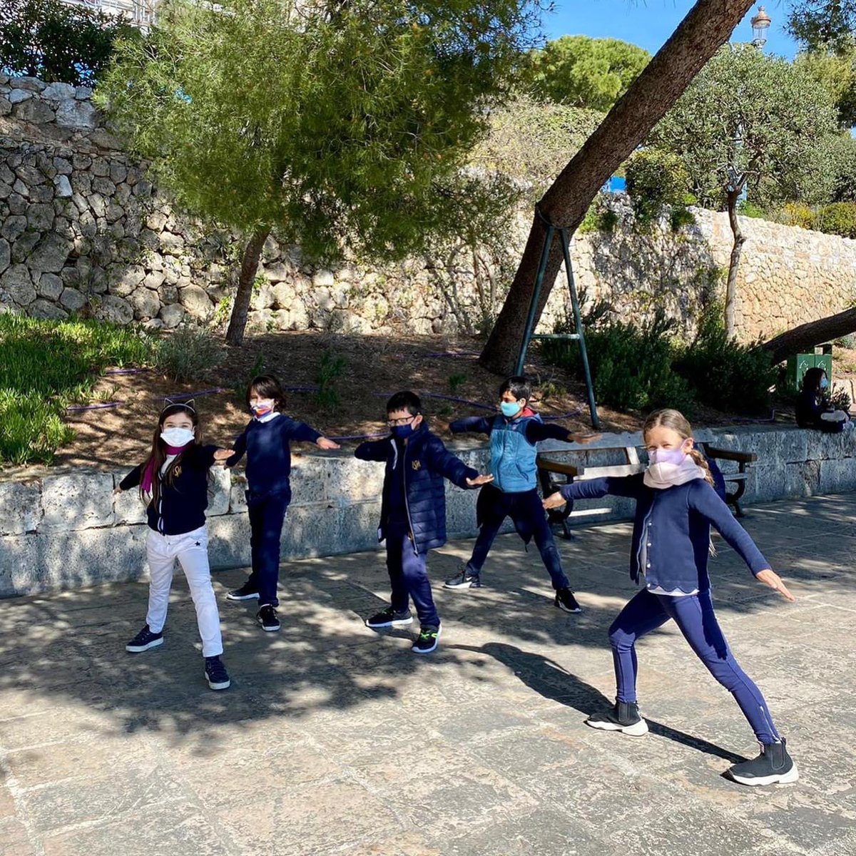 ISMonaco's tweet photo. Today, our Year 4 students had the opportunity to teach their classmates their favourite #yoga postures! Can you recognise which ones? 🧘‍♂️☀️🧘‍♀️ 

#students #outsideyoga #yogawithaview #freshair #movement #wellbeing #education #internationalschool #bilingualschool #monaco https://t.co/jR6WY8b6pS