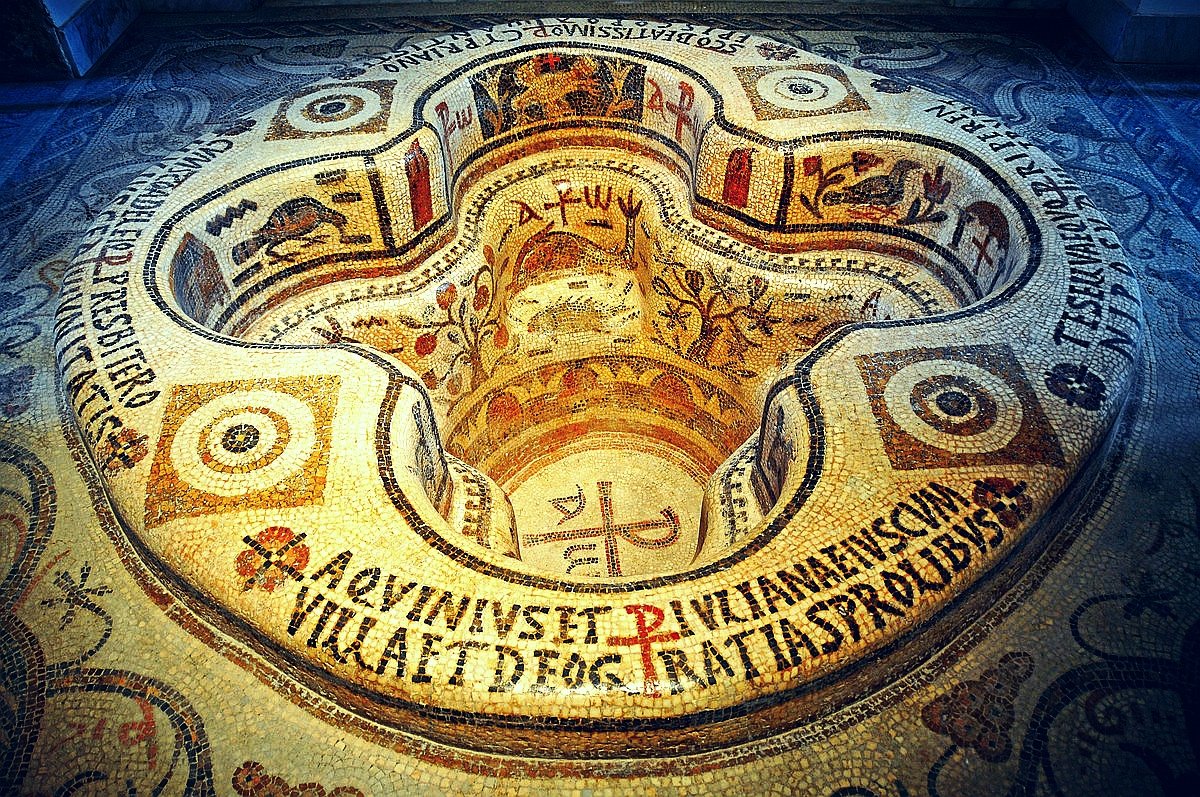 A beautiful 6thC AD baptismal font recovered from the ruins of a basilica in Demna, Tunisia. Richly decorated with some of the most fantastic surviving mosaic work, the fragile font was rescued and now sits as a centre piece in the Bardo national museum, Tunis.