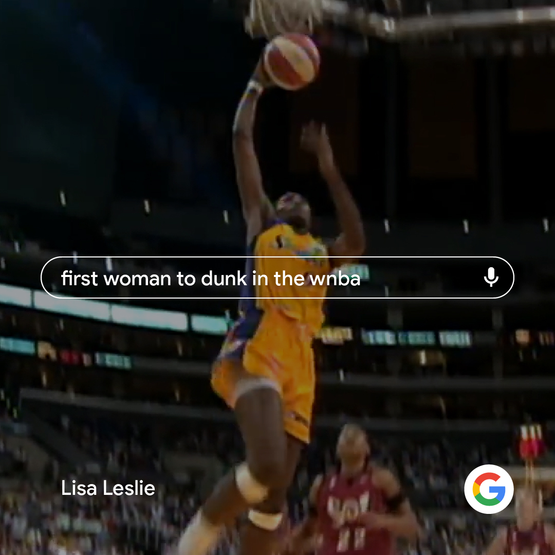 Photo of Lisa Leslie's historic first dunk in the WNBA. Her name appears in the bottom left corner of the frame with the Google logo in the bottom right corner. A Google search bar is in the middle of the picture with copy that reads "first woman to dunk in the WNBA"