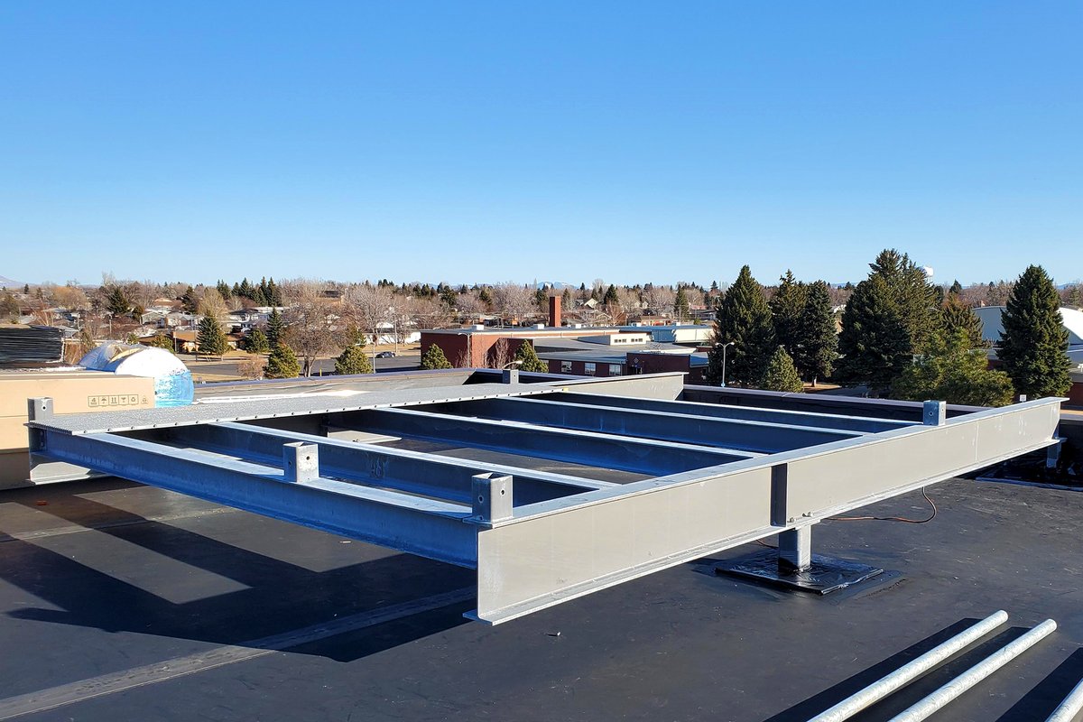 LegacyTowers's tweet photo. Meet Fast Eddie. That's the nickname for this rooftop project over in Montana. So far it's just the steel framework for the antennas and the fiberglass shroud, but stay tuned - we're hustling to make it happen! #LegacyTowers #AlwaysMovingForward #BuildingBetterBandwidth https://t.co/k1P3UV9NxR