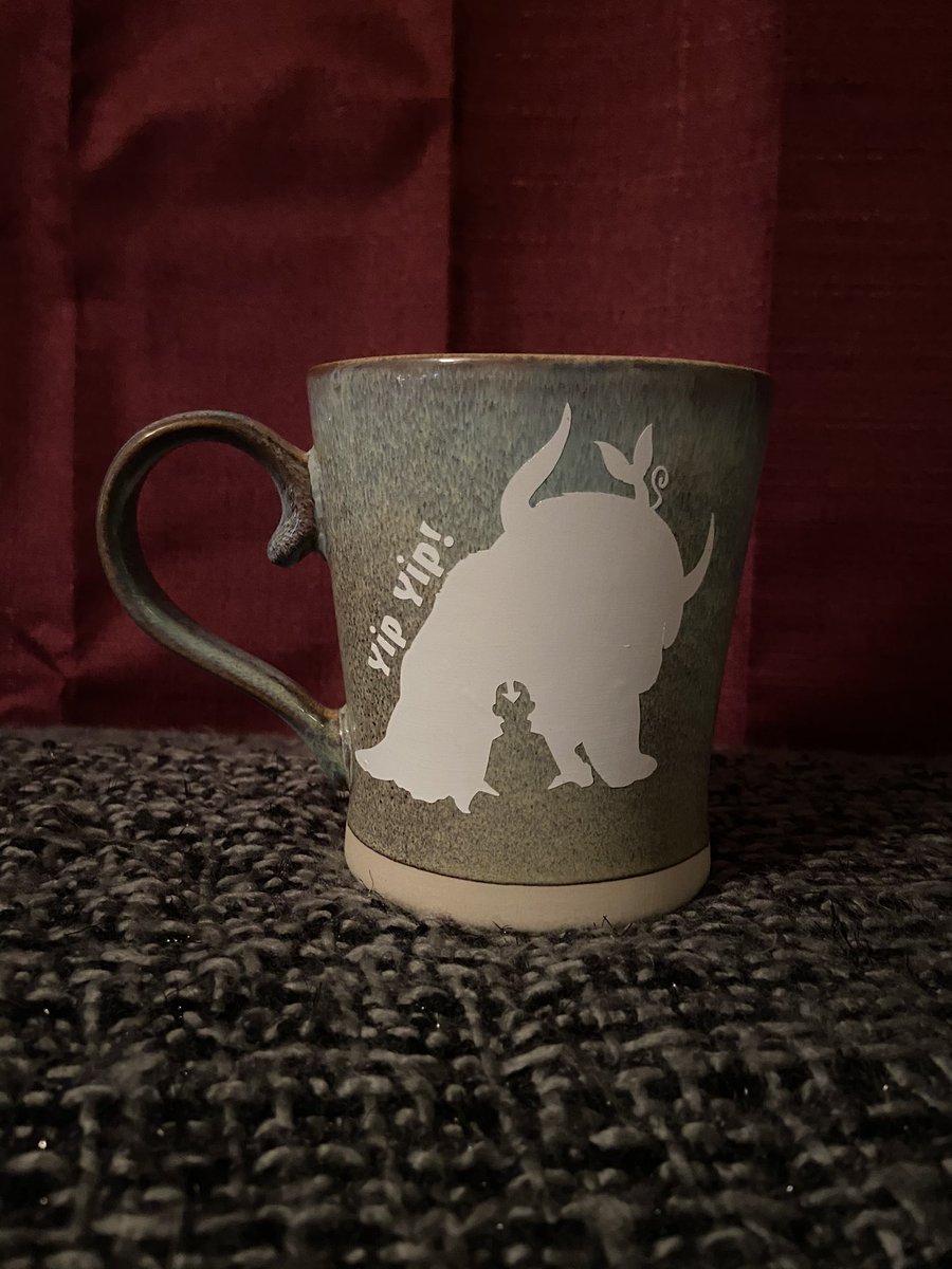 Wylde__Flower's tweet photo. “Yip Yip!” Another Avatar themed mug. If you would like a custom made mug message me! I usually charge $10. #appa #avatar #avatarthelastairbender #appamug #yipyip #aang #momo #custom #custommug #vinyl #customvinyl #mug #smallbusiness #cksmolcrafts #cksmolcraft https://t.co/WClpPEd3Rg