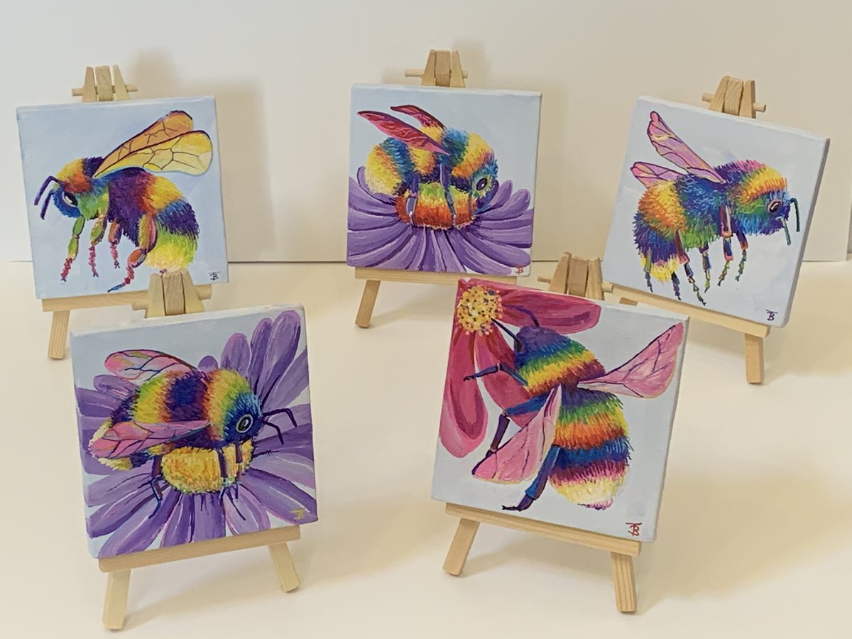 tiffanyjbudd's tweet photo. Here’s a preview of my little #rainbowbee collection not yet on sale anywhere! Each 10cm square with their own display easel. #ArtistOnTwitter #artshare #supportsmallbusiness #artist #bumblebees #rainbow #canvas https://t.co/ekA1WYJbvD