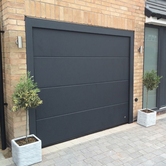 door_mw's tweet photo. We are now supplying and fitting American style up and over sectional doors contact us for more details or find us on https://t.co/qJK4iZQtjA https://t.co/QbSufX1Ch1