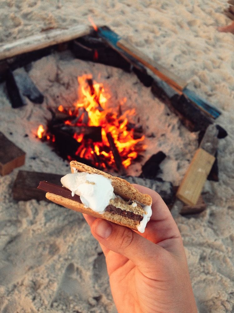 louis studies the string of white hanging off the edge and then he shoves half of it into his mouth in one go, and his eyes instantly widen comically, a stifled gasp leaving his lips.

so s’mores might possibly be the absolute best thing louis has ever tasted in his entire life.