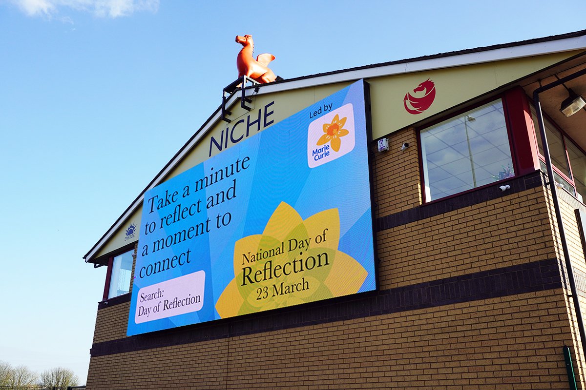 MarieCurieCymru's tweet photo. Thank you @nicheifa for supporting the #Nationaldayofreflection with your brilliant advertising space & for taking part tomorrow.
Please join us to #UniteInMemory tomorrow to reflect on our collective loss, support those who’ve been bereaved, and hope for a brighter future. https://t.co/2rquh9BKv4