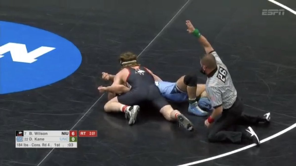 NIUWrestling's tweet photo. The sequence leading to Brit Wilson securing the fall and becoming an All-American! #worklikeadog https://t.co/ujCCFDP189