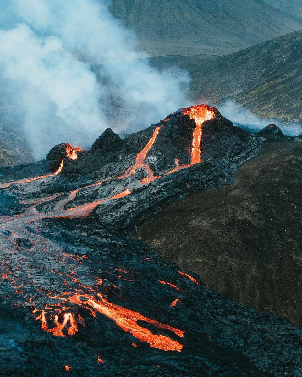 earth's tweet photo. Newly formed lava flowing over the plains of Iceland. https://t.co/iae2K3jU6p