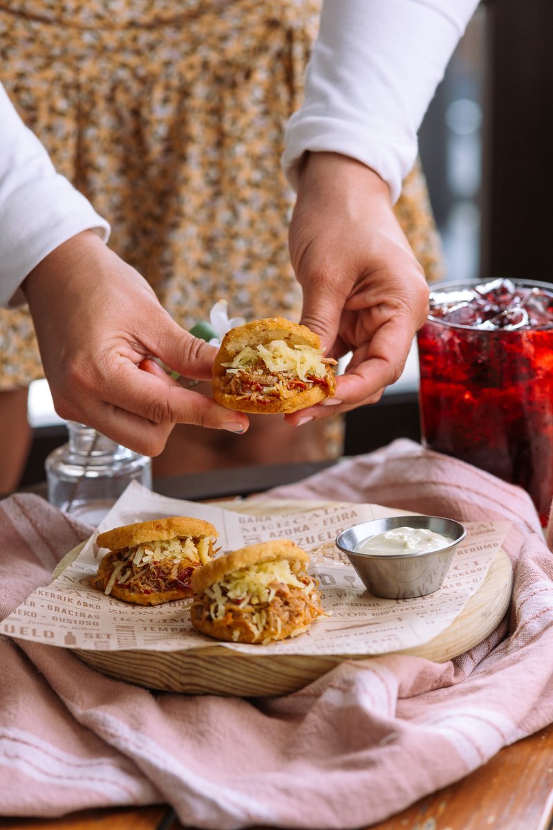 BullaGastrobar's tweet photo. Launching tomorrow, devour our Arepitas Ibericas - white corn & Serrano ham pockets filled with a delicious combination of braised pork & piquillo peppers and topped with Mahon cheese. Available at all of our BOOYAH locations. πͺπΈ
#BullaHour #Dinner #Sangria #Spain #Tapas #Foodie https://t.co/AFlFSDnOxk