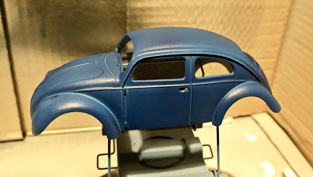Have I mentioned recently how much I love my cheap airbrush? First coat and it did this with 1ml of paint mixed 50/50 with thinner. It's darker than I was anticipating, but that's okay, I'll press on with enbeetling the Beetle. If it doesn't work, it'll still look interesting.