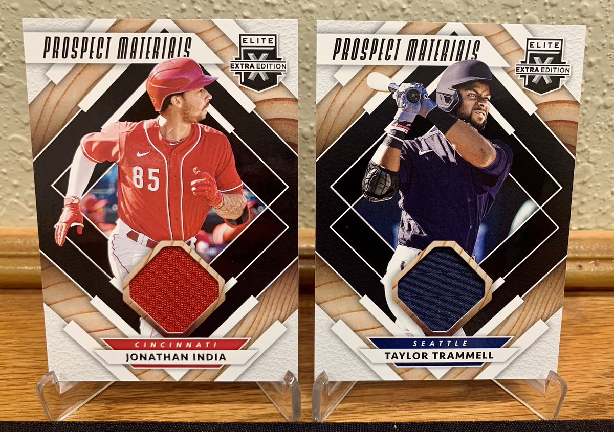 #thehobby giveaway. 2020 Elite Extra Edition Prospect Materials relics of #Reds Jonathan India and #Mariners Taylor Trammell. One person gets both pieces. Just be following our account and Retweet. Winner chosen shortly after we reach 9,000 Followers. Thank you all! 🙏
