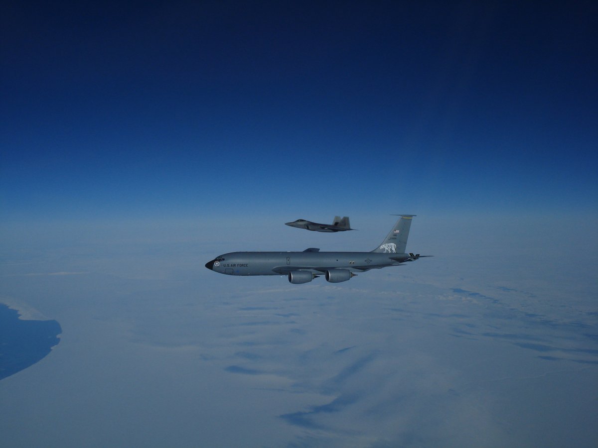 NORADCommand's tweet photo. F-22s and a KC-135 from the Alaskan NORAD Region flew intercept training missions in support of #NORAD today near St. Lawrence Island in the North Bering Sea. Training and operating in the #Arctic ensures our readiness to defend the 🇺🇸 and 🇨🇦. 
#WeHaveTheWatch #AirDefense https://t.co/VFbyznj7U8