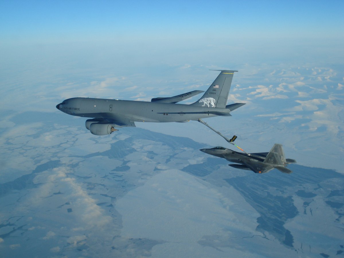 NORADCommand's tweet photo. F-22s and a KC-135 from the Alaskan NORAD Region flew intercept training missions in support of #NORAD today near St. Lawrence Island in the North Bering Sea. Training and operating in the #Arctic ensures our readiness to defend the 🇺🇸 and 🇨🇦. 
#WeHaveTheWatch #AirDefense https://t.co/VFbyznj7U8