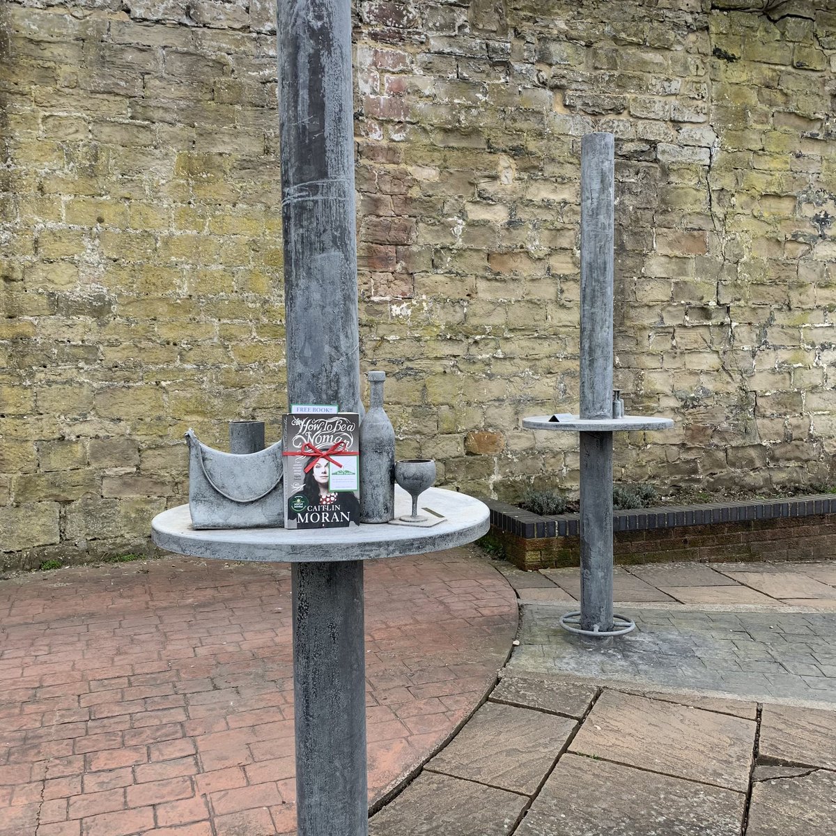 Bookfairies_NE's tweet photo. You could find a copy of #HowToBeAWoman by @caitlinmoran dancing around this handbag at the Nightclub Shadow and Memories sculpture in South Shields which is on the site of the La Strada nightclub 
💃 🕺 
#ibelieveinbookfairies #BookfairyBirthday #sharetheloveofreading https://t.co/tr1o8KNC1Y