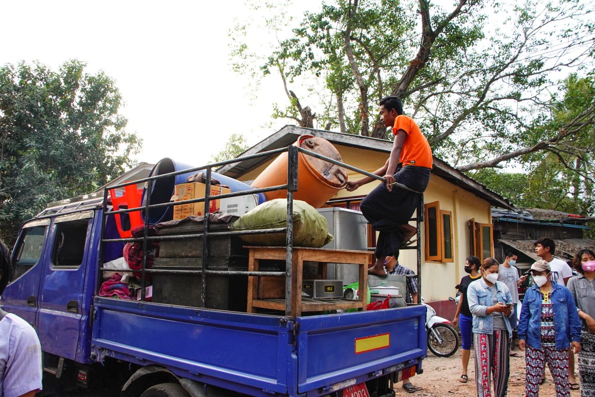 IrrawaddyNews's tweet photo. Railway employees and their families from 15 households in the Mon State capital #Mawlamyine left their government-provided quarters on Mar. 23 after being evicted due to their participation in the #CivilDisobedienceMovement.(Photo: Mawlamyine’s Voice) #WhatsHappeningInMyanmar https://t.co/QE8p2cPjAF