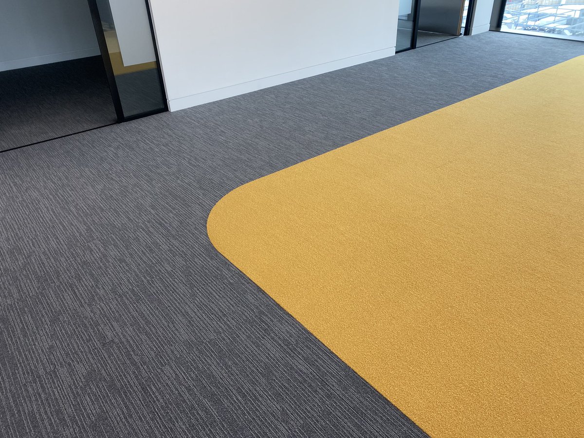 LccPlc's tweet photo. A lovely installation of @MillikenEurope carpet tiles in one of our Stratford projects. The yellow and blue contrast coming together nicely! Great to work alongside @Overburyplc and @perkinswill_LON again. #weknowflooring #london #city #flooring #construction https://t.co/27s4MJ3NPv