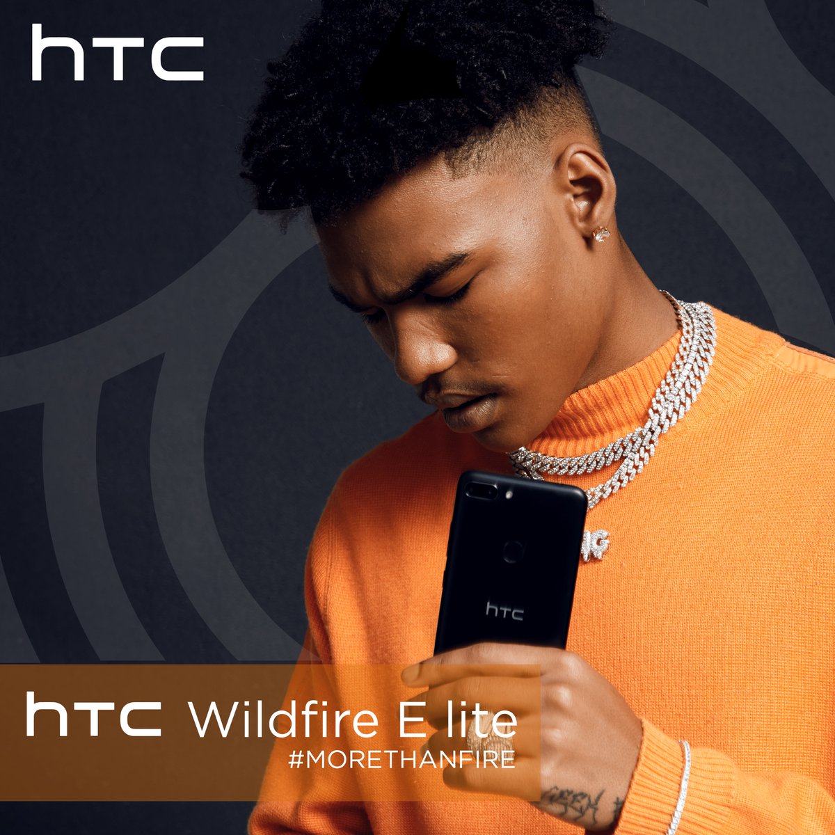 htc_za_shop's tweet photo. Bring the fire the way  @LucasRaps_SA  does with the all-new HTC Wildfire E lite. 

Become #MoreThanFire and start something 🔥
#HTC #MoreThanFire #WildfireElite https://t.co/M8FY2qEzsy