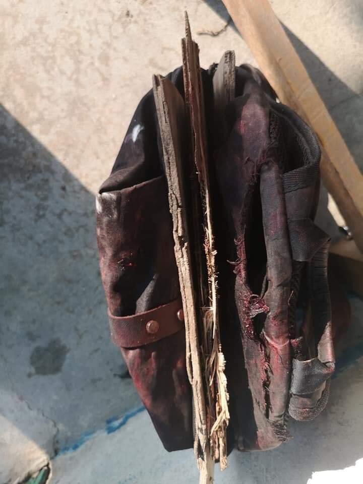 PhyoNyeinPaing2's tweet photo. This poor boy carried 3 sheets of DIY plywood in his bag hoping to prevent the bullet but it didnβt save him from #AungPinLel crackdown by Junta forces and he was shot in the head. Devastating!#WhatsHappeningInMyanmar #Mar23Coup https://t.co/AzxqbWzE9J