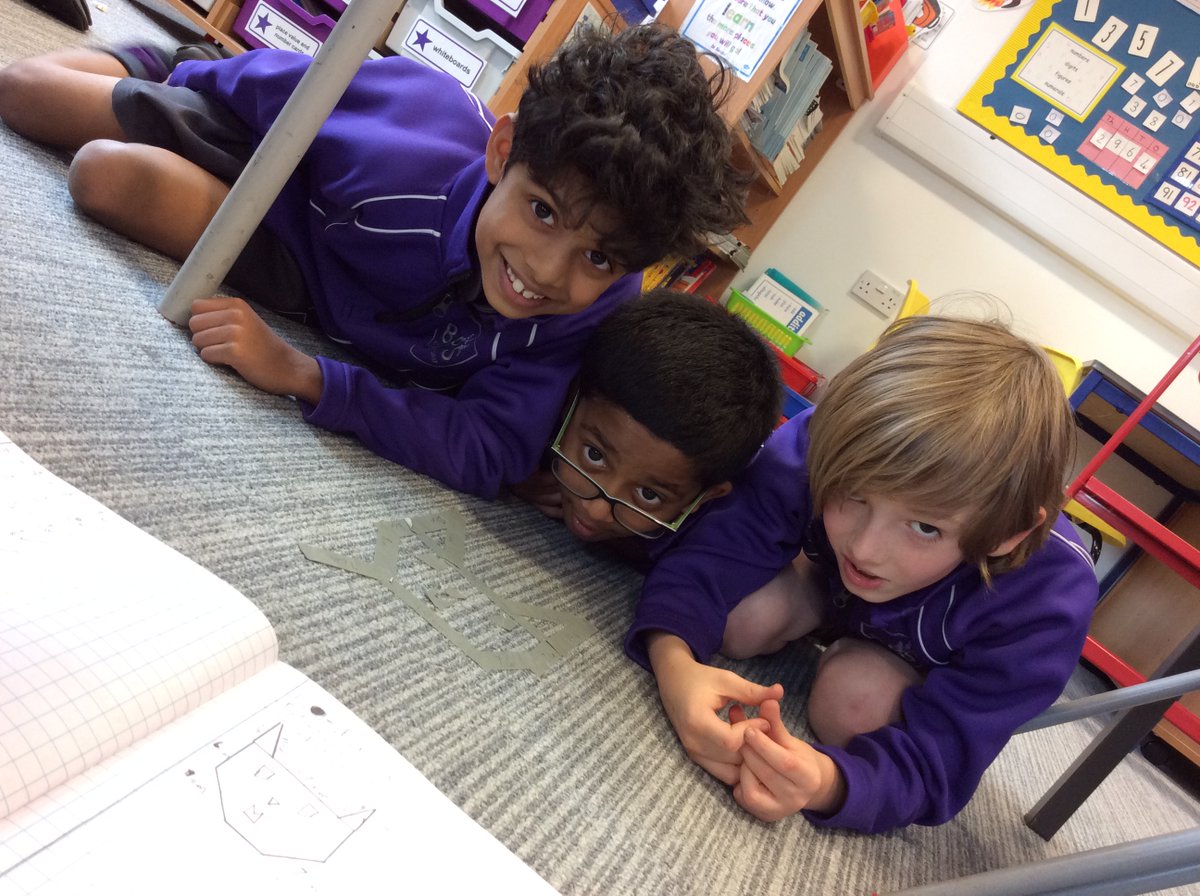 BansteadPrep's tweet photo. #Year3 revising perimeter and having some Easter fun. They are making rabbit or egg shapes from masking tape, measuring the perimeter and recording this in their books. #BPS_Maths https://t.co/GU0dXdci1C