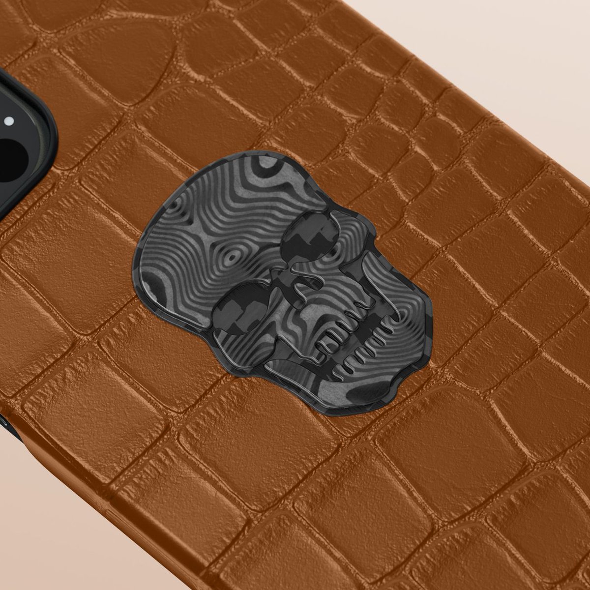 labodetofficial's tweet photo. A bold carbon skull decorates the new edition of our Classic leather cases. The skull is forged from two carbon fiber plates with different patterns to add depth and volume to its design. Available in alligator, python, and ostrich leathers. https://t.co/e0KcecgdIL
#Labodet https://t.co/zSw0ccrood
