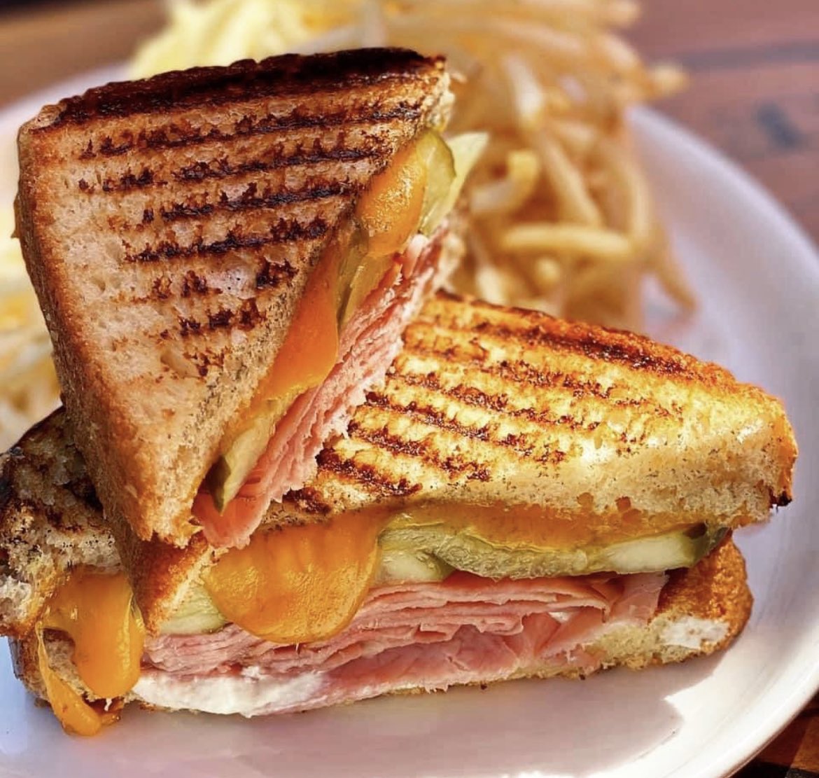 PITCHPIZZERIA's tweet photo. Stop in on this rainy day to enjoy a 🔥 Ham grilled cheese panini, goat cheese, cheddar, pickles, brioche bread. #wonderoftheweek #dundee #scottsdale #omaha #elkhorn #oldtownscottsdale #Lunch #luvpitch #Pitch #sandwhich #fries #trufflefries https://t.co/ShBnj2iKXp
