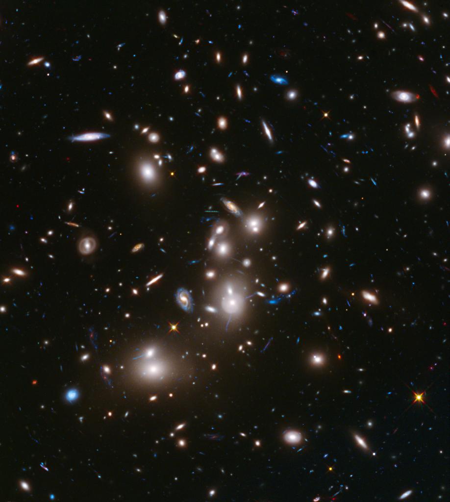 An image of galaxy cluster Abell 2744. Galaxy clusters can act as a natural cosmic lens, magnifying light from more distant, background objects through gravity. NASA’s James Webb Space Telescope may be able to detect light from the first stars in the universe if they are gravitationally lensed by such clusters.