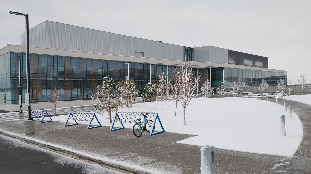 JD_Hamel's tweet photo. 🌨️ The @UofLethbridge is momentarily back to some #wintery weather! ❄️ I don't understand the person that took their bike when I #slipped twice walking the 300m between my car and the Science Commons building... 🤷🏻‍♂️ Someone is much braver/talented than me!! 😂 https://t.co/yQV0Aw316d