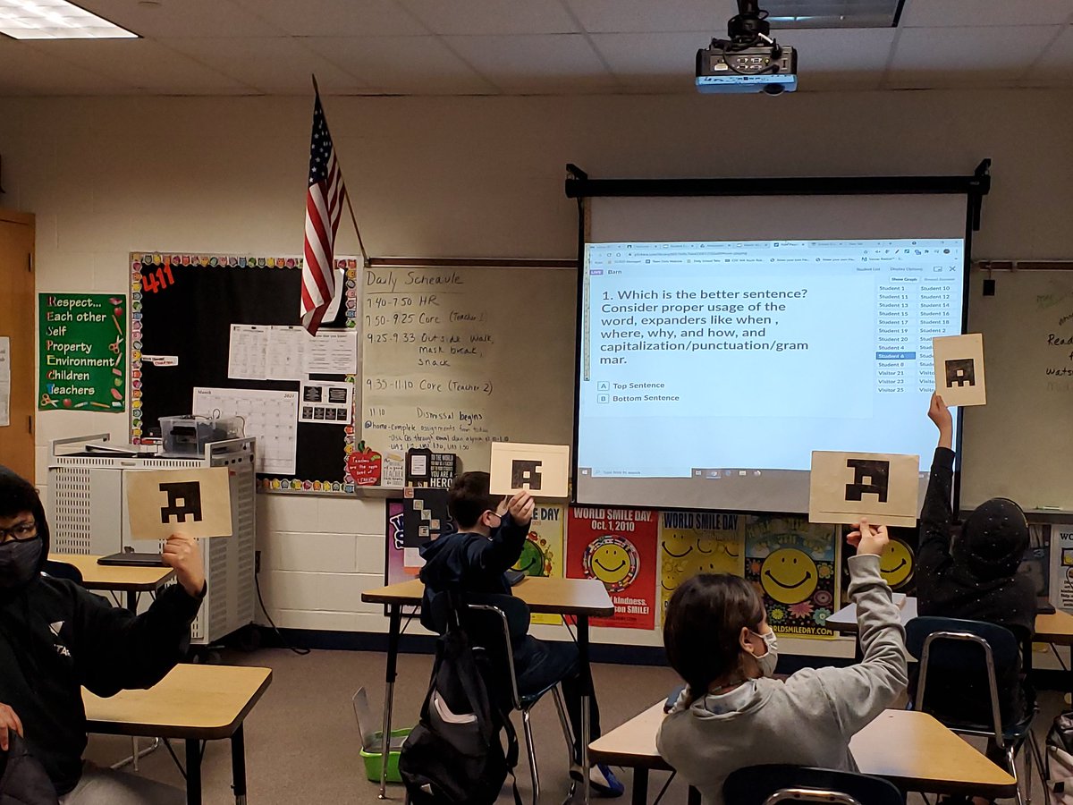 CMSOwls's tweet photo. Using @plickers for voting in our March Madness Vocab Sentence Tourney! I look forward to this every year. 😊 #6thgrade @cms_grizzlies https://t.co/KcNlQQB06h