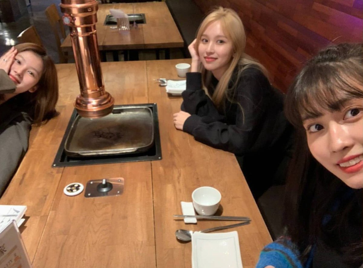 minaspingu's tweet photo. remember when sana and momo brought mina to a bbq restaurant to celebrate her birthday last year? they're literally family🥺 https://t.co/04doJn6NXQ