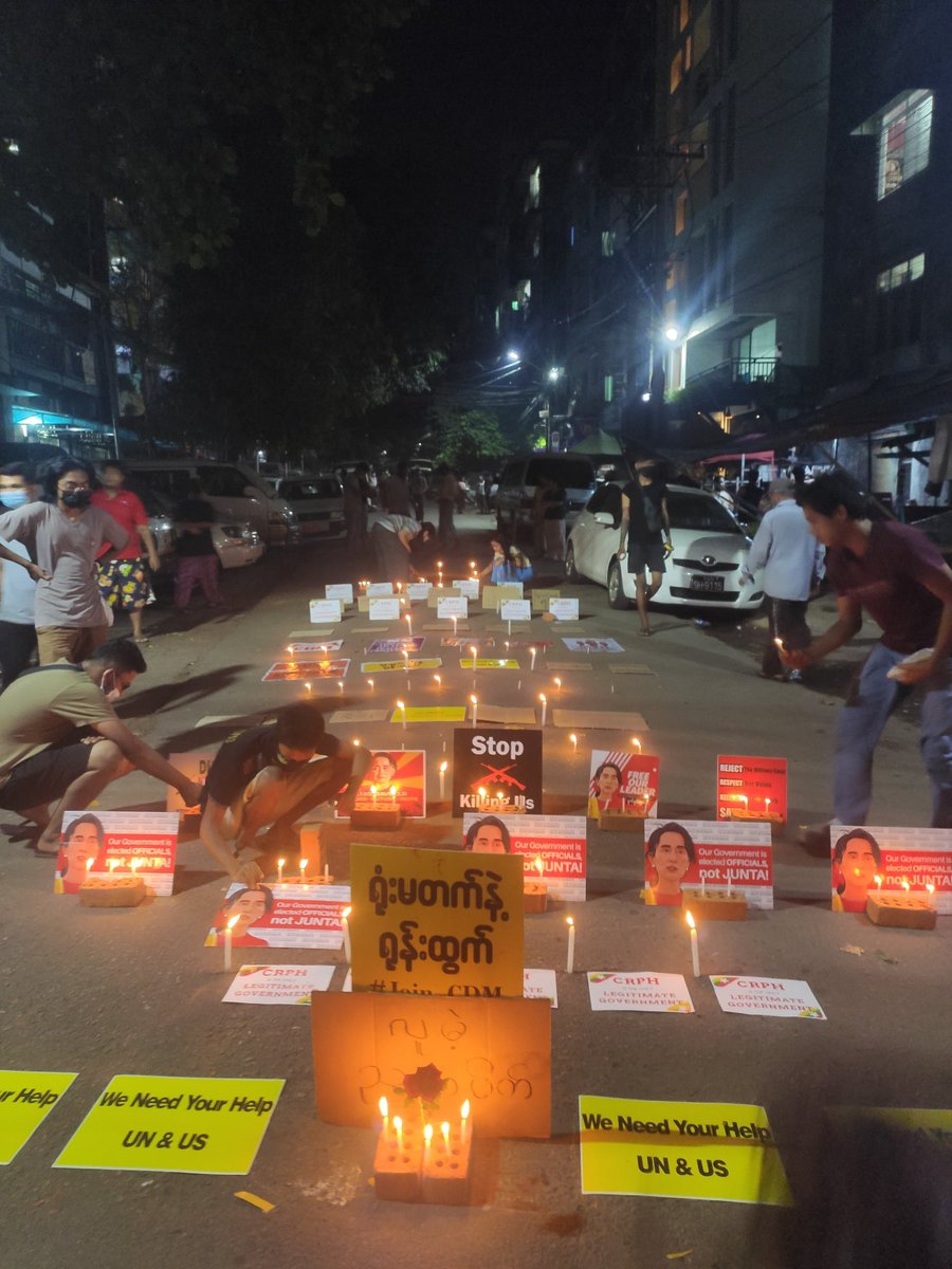Myanmar_Now_Eng's tweet photo. Event protests continued in Myanmar. These are from Thaton in Mon State and Sanchaung in Yangon. One of the papers says in Burmese, “You have arms. The people have belief.” #WhatsHappeningInMaynmar https://t.co/JWy1wE3WkT