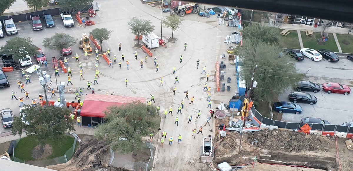 AustinCML's tweet photo. The health and safety of our workers is very important to us. Craft workers at @UHouston's John M. O’Quinn Law Building begin their day with a socially distanced stretch and flex session to prevent muscle sprains and strains. #AustinSafe https://t.co/qzoFMxZe9E