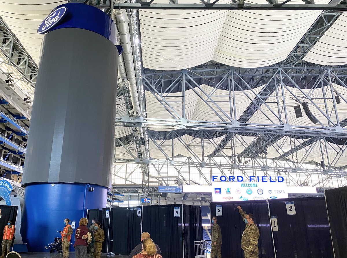 Geraghty8's tweet photo. Vaccinated today @fordfield by a US Air Force officer! Incredibly impressive operation. So thankful to science &amp; to @pfizer, @meijer, @fema @usairforce, @fordfield staff and @GovWhitmer! One more to go! #COVID19Vaccination #PfizerCovidVaccine https://t.co/B2hkhlM58w