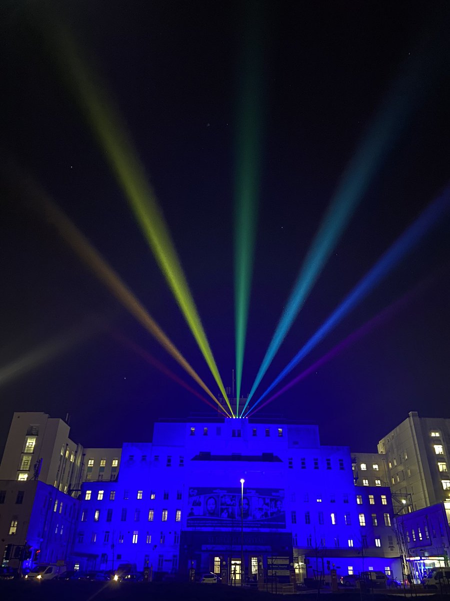 danielelkeles's tweet image. Epsom and St Helier bathed in blue light, with ‘rainbows of reflection’ projected from the rooftops this evening. It has been a profoundly difficult year, which we marked at 12pm and 8pm with a minute’s silence, and shine these light this evening. #nationaldayofreflection #covid
