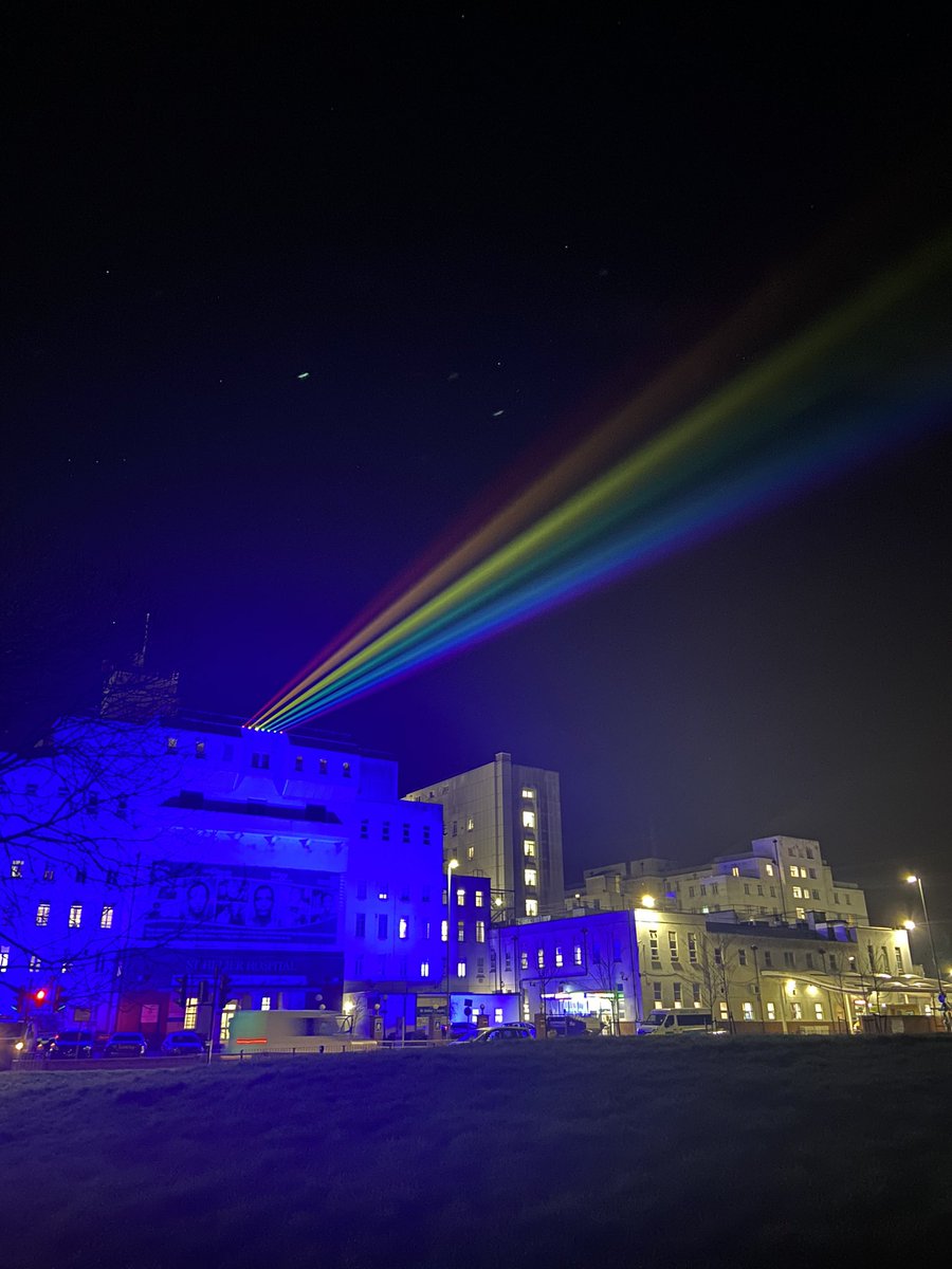 danielelkeles's tweet image. Epsom and St Helier bathed in blue light, with ‘rainbows of reflection’ projected from the rooftops this evening. It has been a profoundly difficult year, which we marked at 12pm and 8pm with a minute’s silence, and shine these light this evening. #nationaldayofreflection #covid