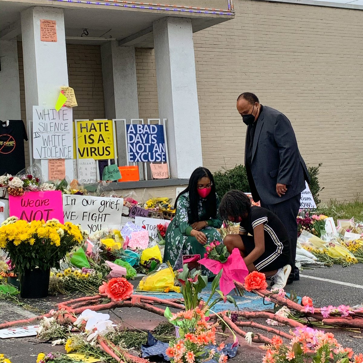 Laying flowers to honor those killed in our Atlanta community last week. May their souls Rest In Peace. #StopAsianHate #StopAsianViolence