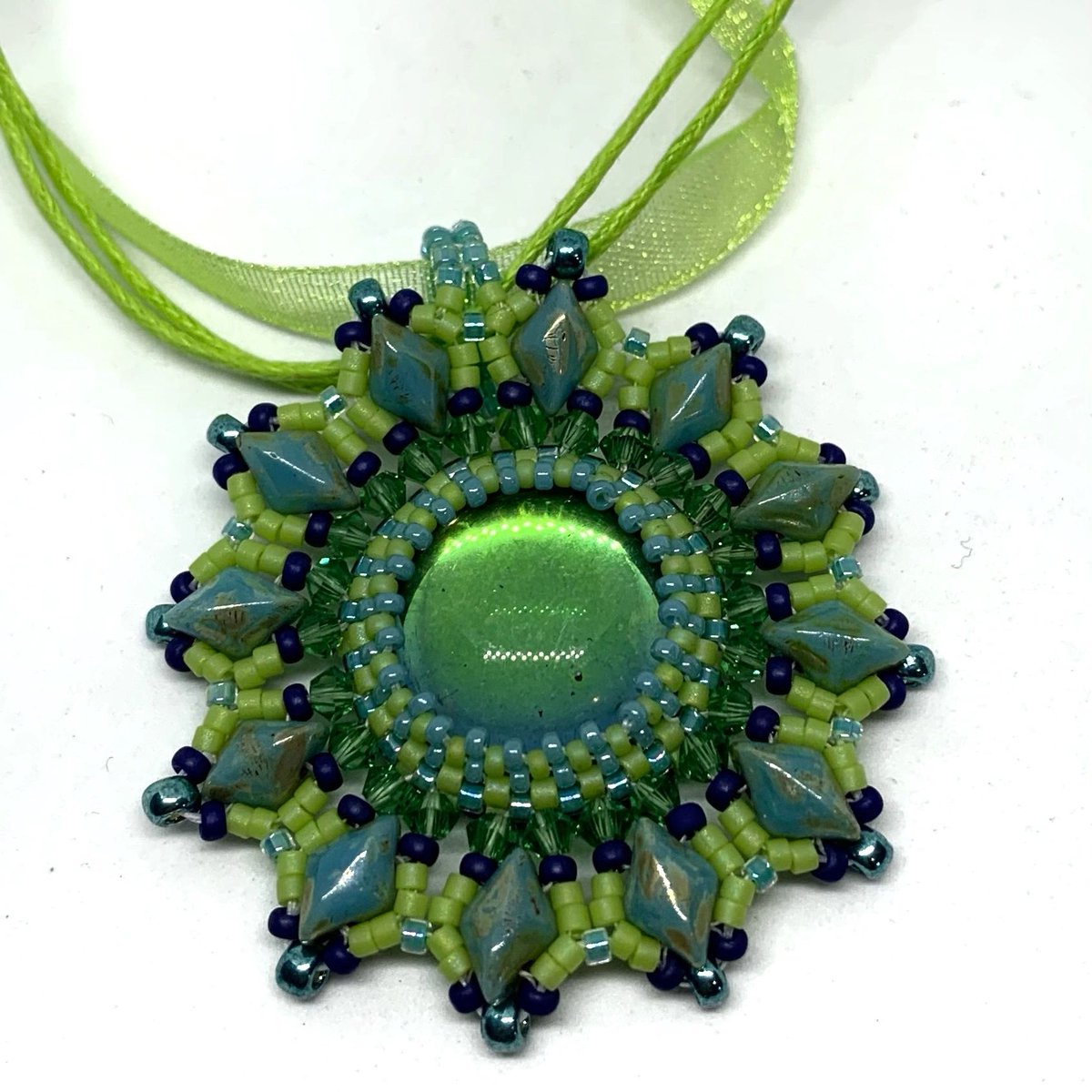 CreativeObs's tweet image. If you wanted a pendant to mark the arrival of spring time, here it is!

creativeobsessionllc.com/shop/ols/produ…