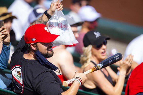 RealKentMurphy's tweet photo. A foul ball drilled this fan’s beer then the Angels gave him some new cold ones and Mike Trout delivered him a signed bat 🐐

(via @rebilasphoto) https://t.co/gs2lH4wuEf