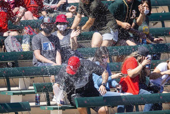 RealKentMurphy's tweet photo. A foul ball drilled this fan’s beer then the Angels gave him some new cold ones and Mike Trout delivered him a signed bat 🐐

(via @rebilasphoto) https://t.co/gs2lH4wuEf
