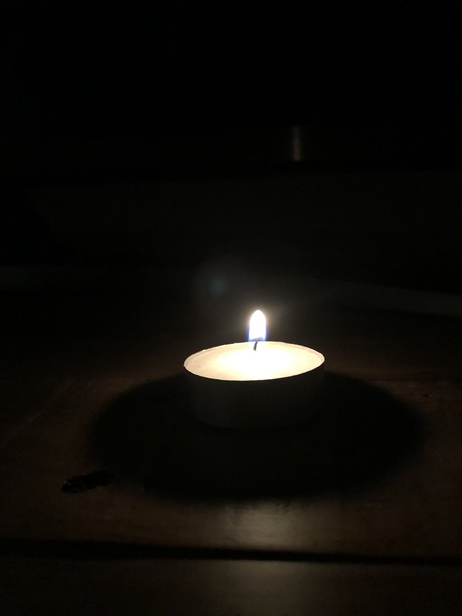 StDennisCFRS's tweet photo. Tonight we lit this candle to reflect on the last 12 months and remember all those that aren’t with us today🕯On this day of #nationalreflection our thoughts are with those who have sadly lost their lives and those who have been effected by COVID-19 🚒🚨 https://t.co/gV0QPOjRry