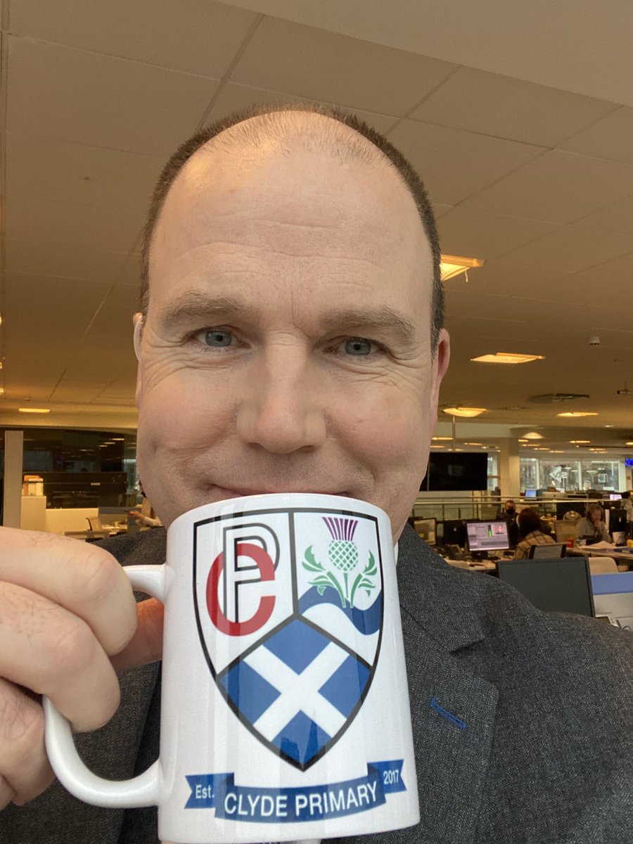MacKayWrites's tweet photo. Posing with my Clyde Mug. Thank you Linda for the nomination. Good luck and best wishes to all at Clyde Primary. @ClydeParentCncl https://t.co/oWBp6pm952