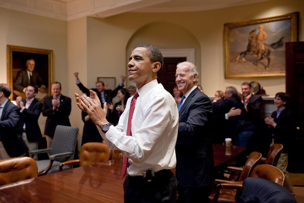 President Biden and President Obama celebrate the passage of the Affordable Care Act